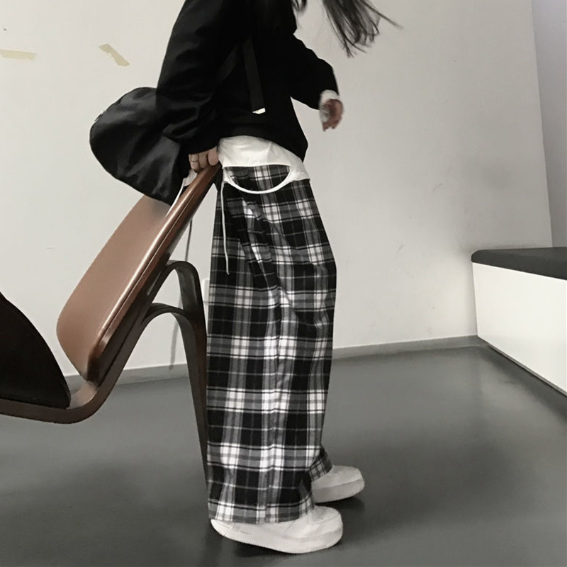 Pantalon large à carreaux écossais noir et blanc femme, tissu à motif tartan, coupe ample et fluide