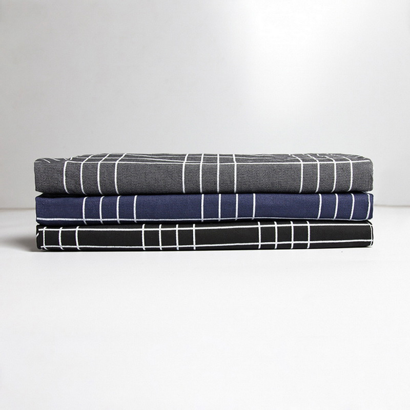 Tissus pliés en tartan à carreaux pour pantalon homme slim, couleurs gris, bleu marine et noir avec lignes blanches