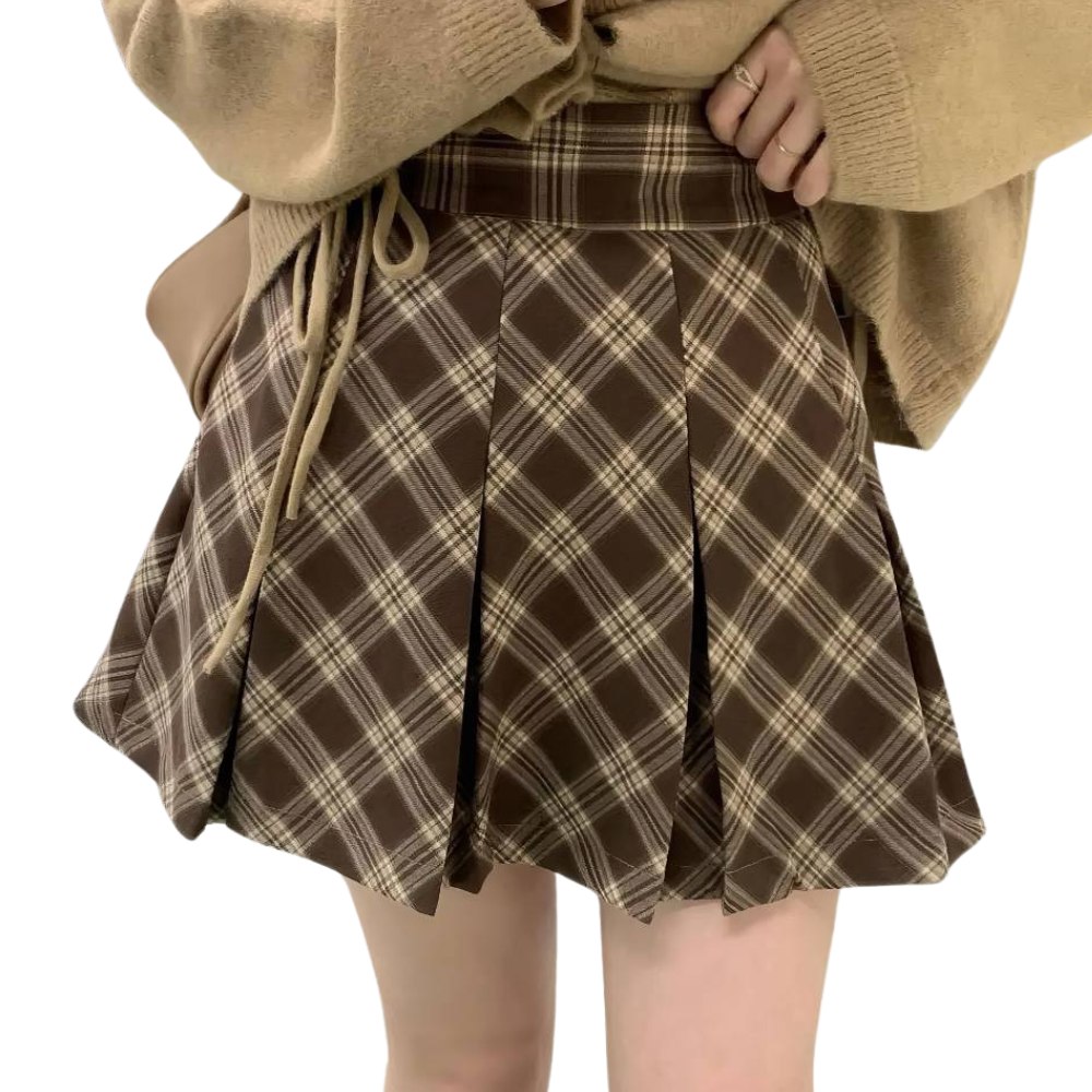 Mini jupe plissée en tartan écossais marron et beige avec motif à carreaux, portée taille haute