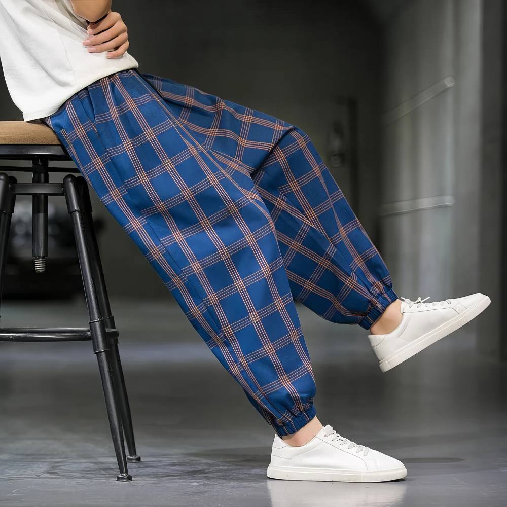 Pantalon écossais homme large bleu et orange à carreaux, coupe ample avec bas resserré