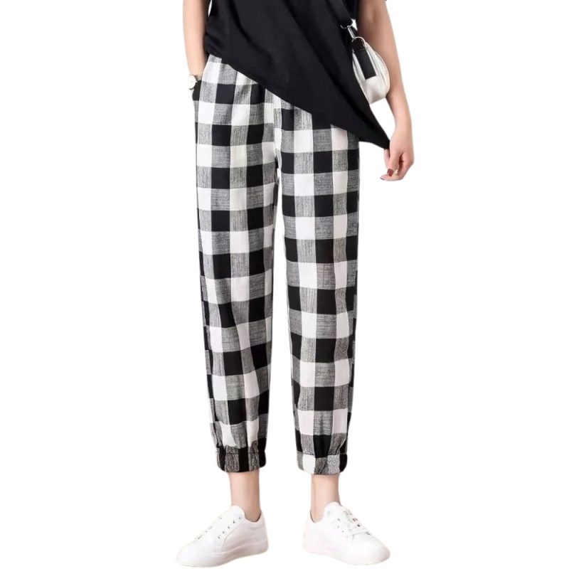 Pantalon jogging femme à carreaux noir et blanc motif écossais avec taille élastique et bas resserré