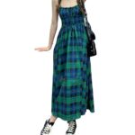Robe écossaise longue à bretelles fines en tissu tartan vert et bleu avec jupe fluide